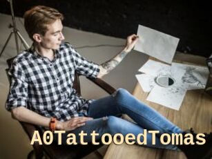 A0TattooedTomas